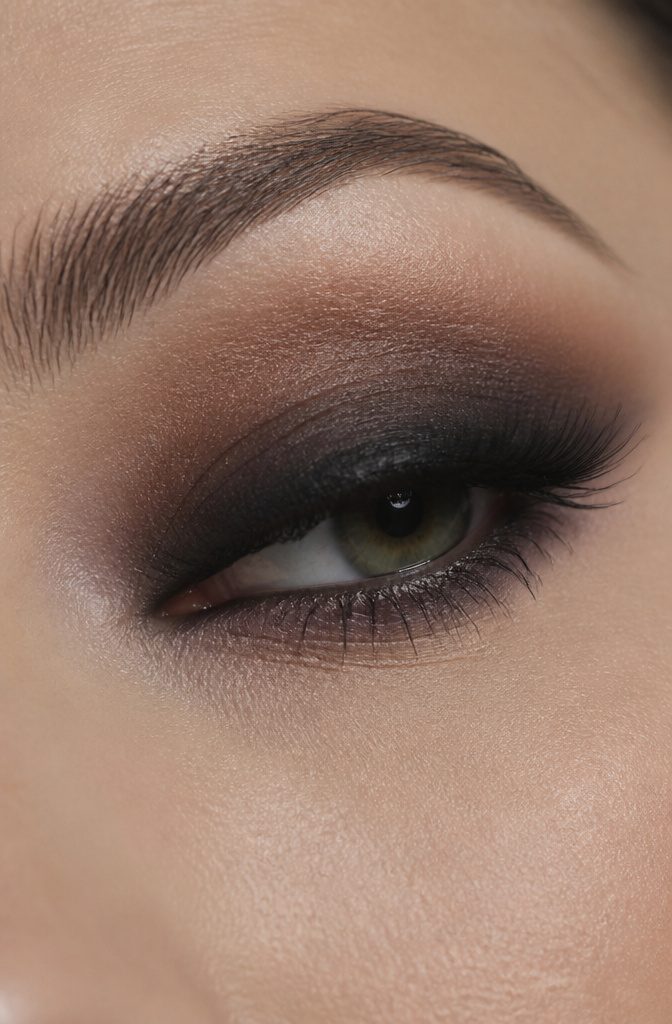 Model with an eye showcasing a stunning ombré effect.