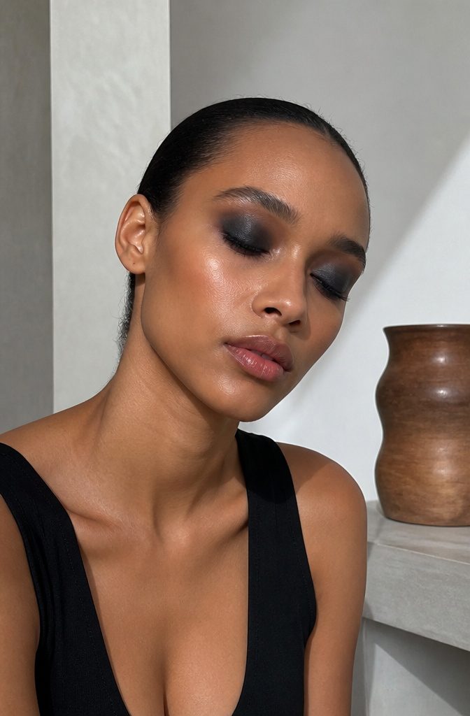 Model presenting a bold statement shadow on her eyelid.