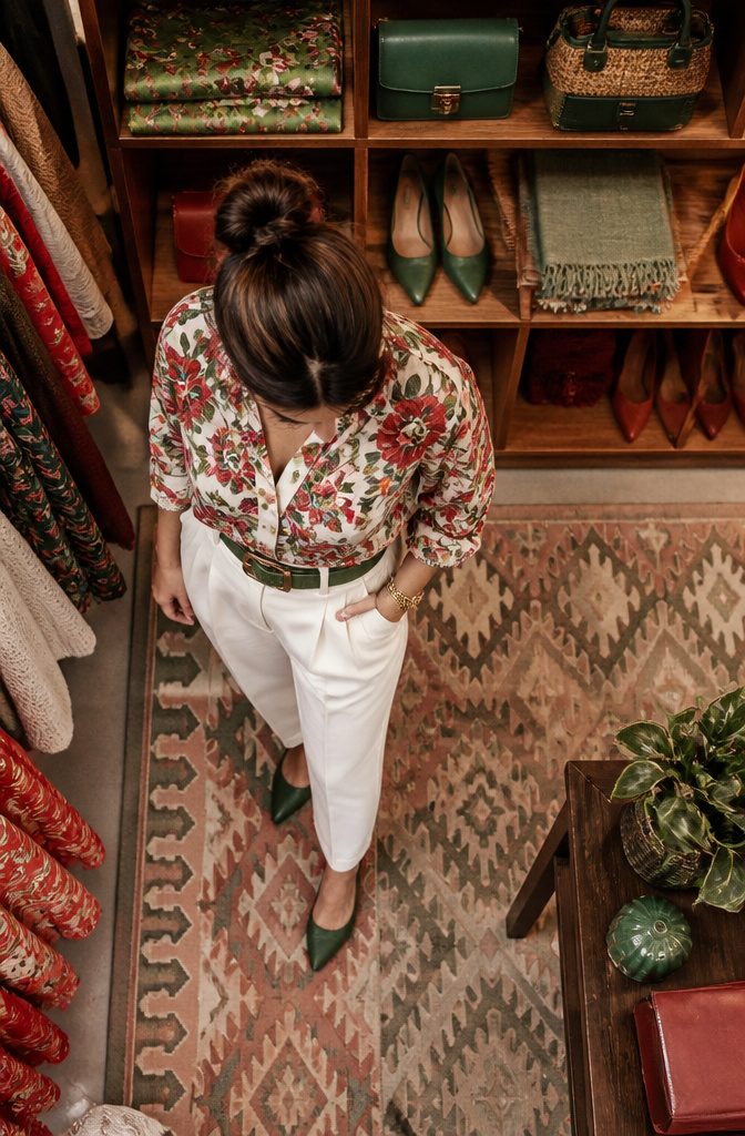 A floral top featuring coordinating colors in an outfit.